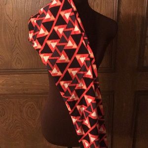 LulaRoe orange and black triangle Leggings
